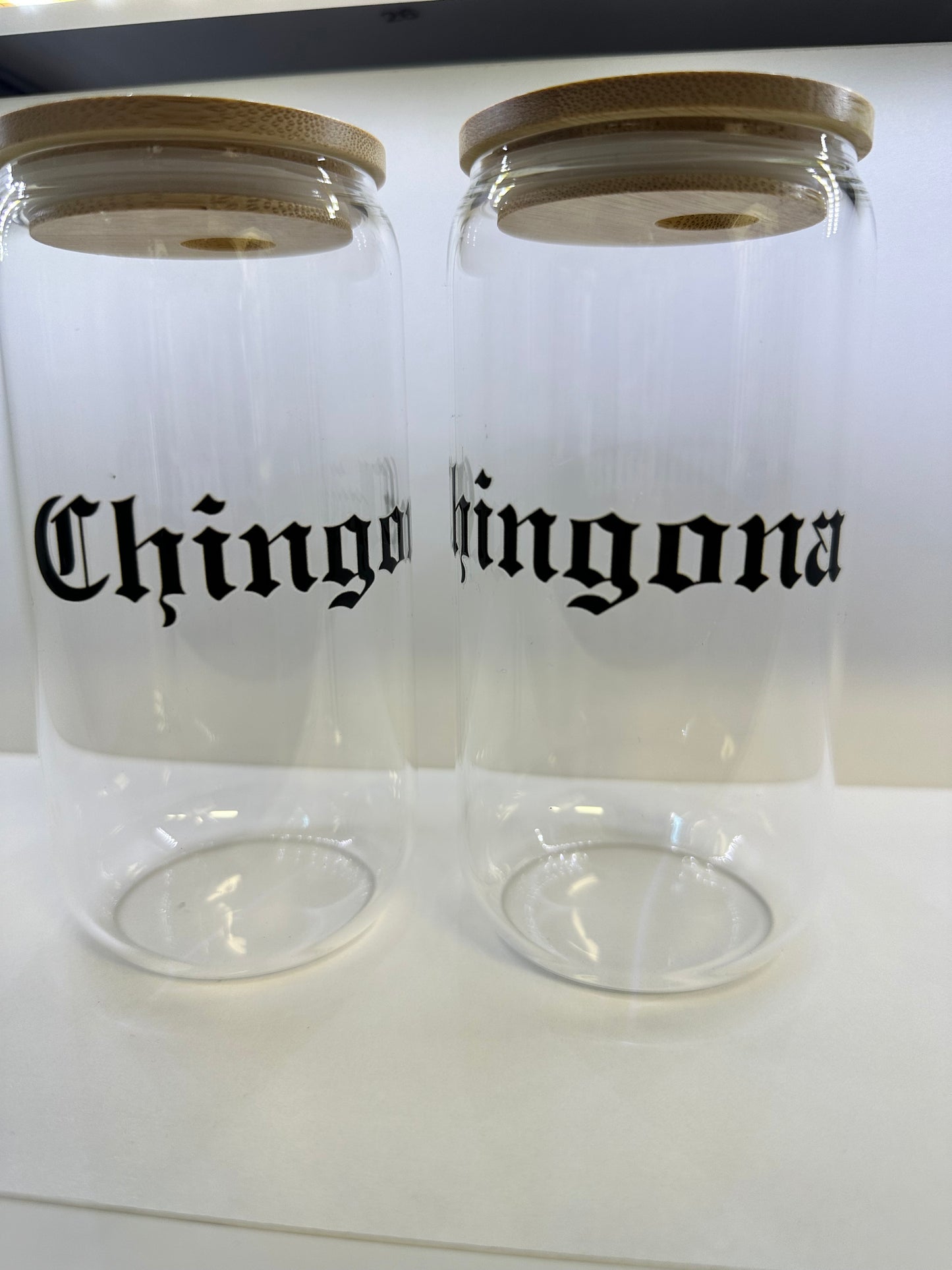 Glass can shape cup with lid and CHINGONA design