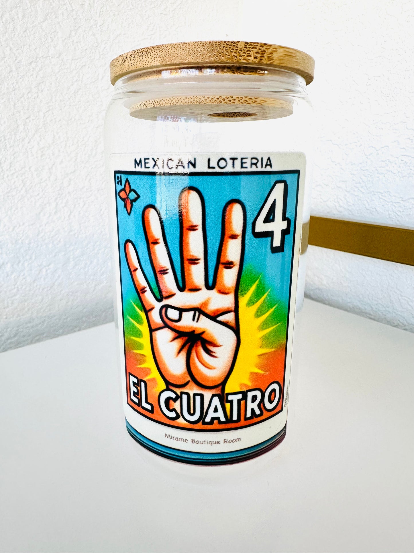 Glass cup with lid and "El 4" Mexican Loteria Card Design