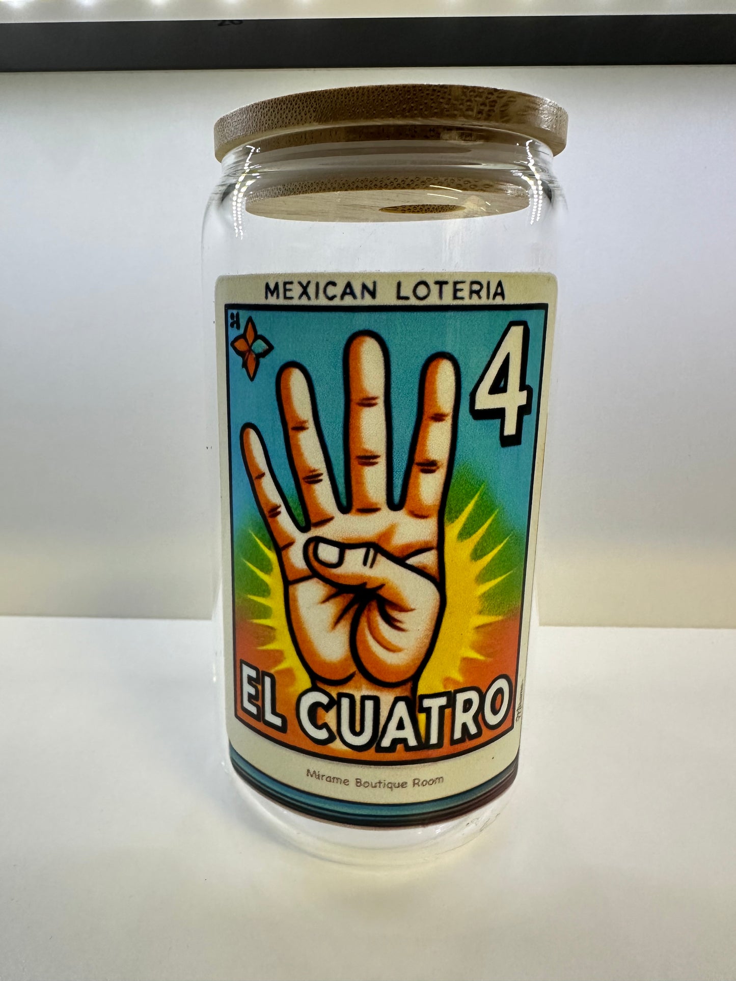 Glass cup with lid and "El 4" Mexican Loteria Card Design