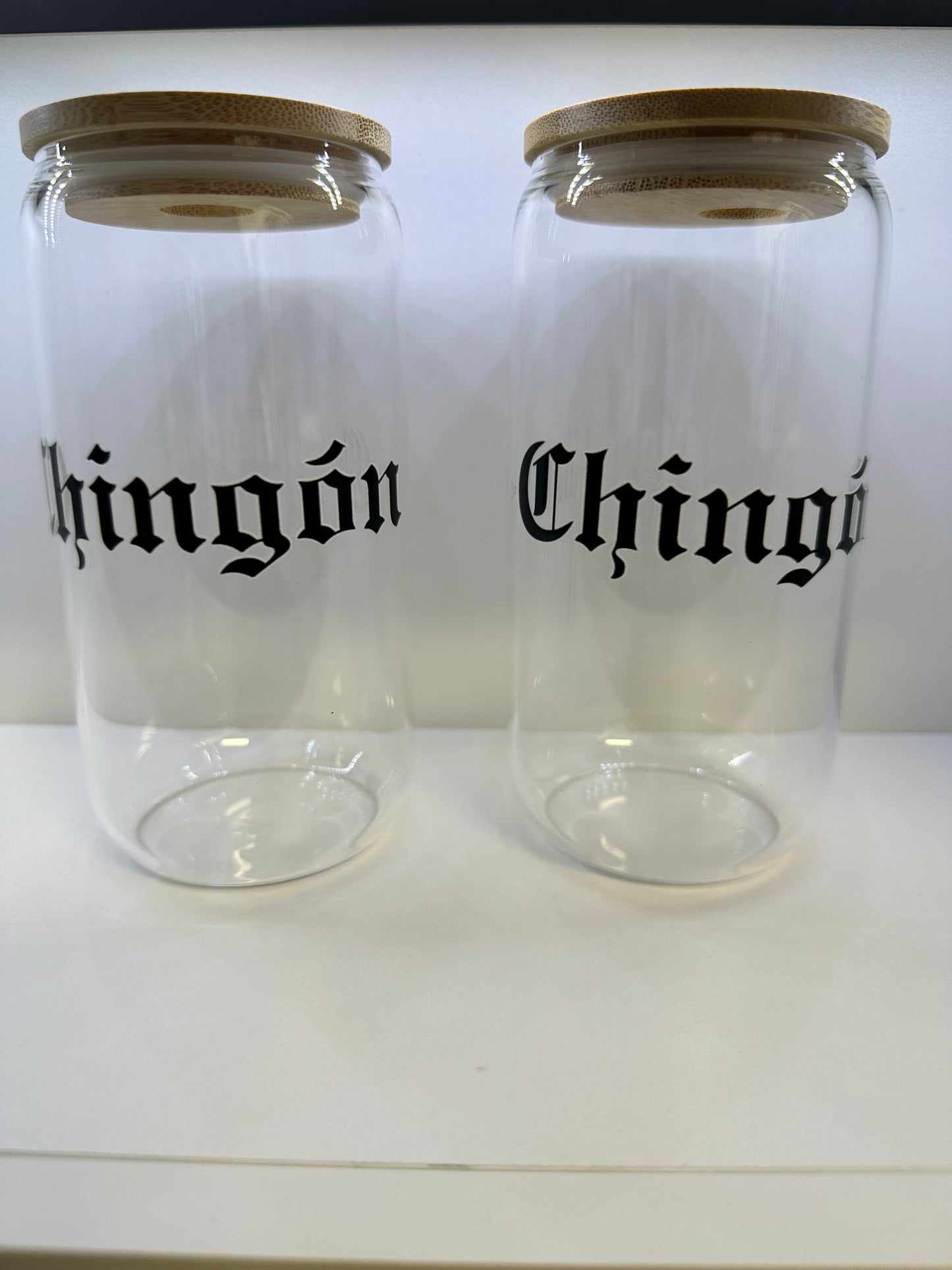 Glass can shape cup with lid and CHINGON design